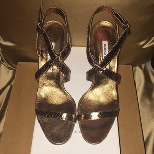 Manolo Blahnik strappy heels.